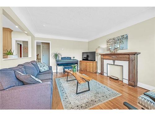 130 Garside Avenue S, Hamilton, ON - Indoor Photo Showing Living Room With Fireplace