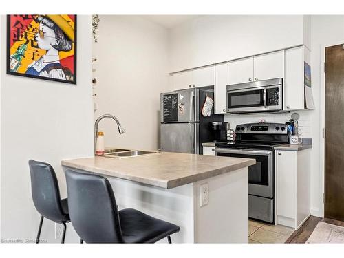 807-112 King Street E, Hamilton, ON - Indoor Photo Showing Kitchen With Double Sink