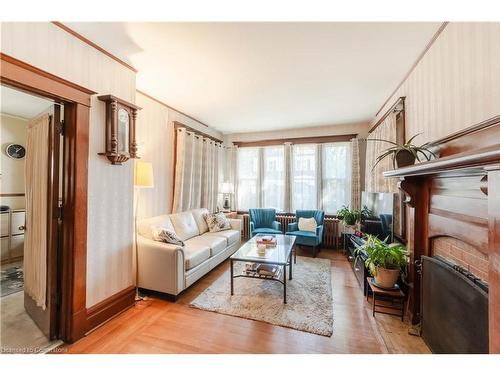 24 Burris Street, Hamilton, ON - Indoor Photo Showing Living Room With Fireplace