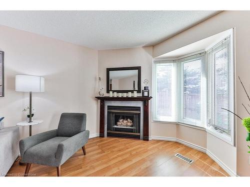 19-1675 Upper Gage Avenue, Hamilton, ON - Indoor Photo Showing Living Room With Fireplace