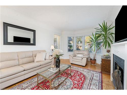 49 Crosthwaite Avenue S, Hamilton, ON - Indoor Photo Showing Living Room With Fireplace