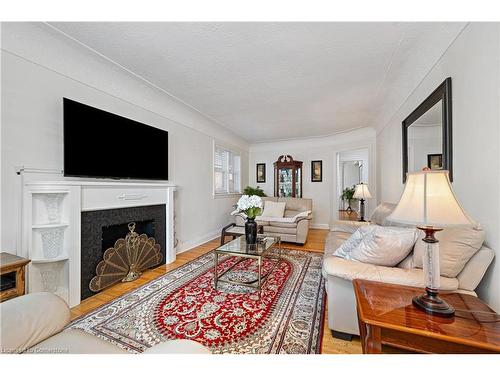 49 Crosthwaite Avenue S, Hamilton, ON - Indoor Photo Showing Living Room With Fireplace