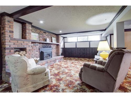 247 Fernwood Crescent, Hamilton, ON - Indoor Photo Showing Living Room With Fireplace