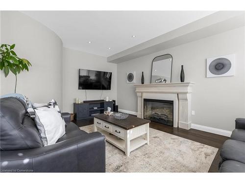 16-270 Main Street W, Grimsby, ON - Indoor Photo Showing Living Room With Fireplace