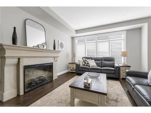 16-270 Main Street W, Grimsby, ON - Indoor Photo Showing Living Room With Fireplace