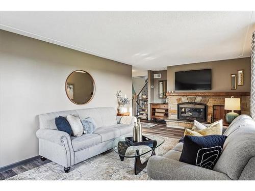 7956 Twenty Road, Smithville, ON - Indoor Photo Showing Living Room With Fireplace