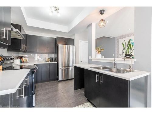 135 Kinsman Drive, Binbrook, ON - Indoor Photo Showing Kitchen With Double Sink With Upgraded Kitchen