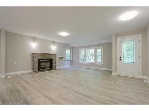 24 Parkside Avenue, South Bruce Peninsula, ON - Indoor Photo Showing Living Room With Fireplace