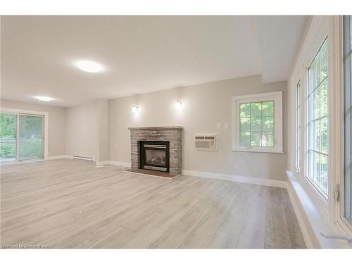 24 Parkside Avenue, South Bruce Peninsula, ON - Indoor Photo Showing Living Room With Fireplace