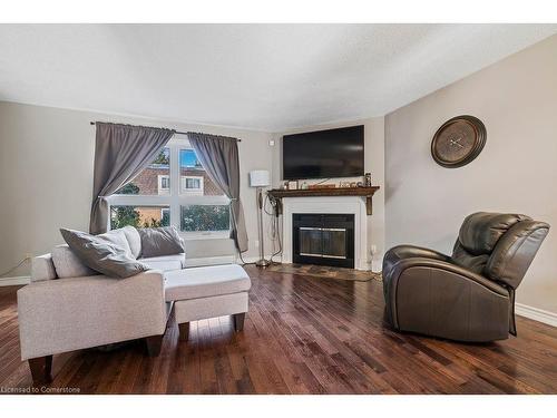 10-51 Caroga Court, Hamilton, ON - Indoor Photo Showing Living Room With Fireplace