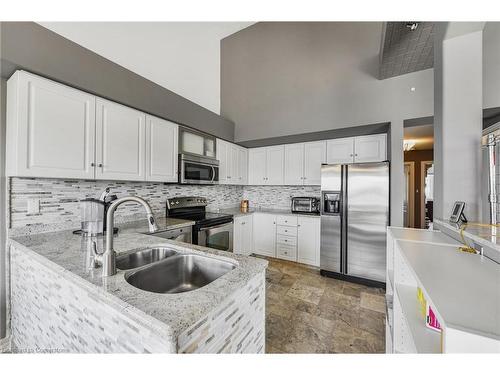 491-493 Dewitt Road, Stoney Creek, ON - Indoor Photo Showing Kitchen With Double Sink With Upgraded Kitchen