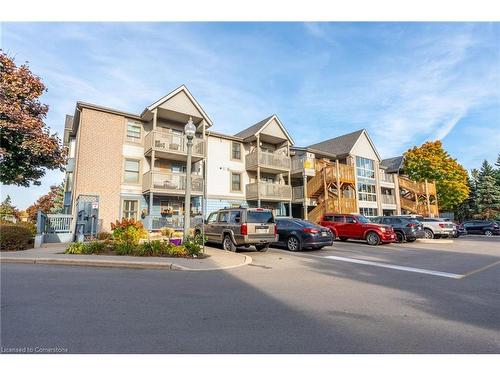 109-2010 Cleaver Avenue, Burlington, ON - Outdoor With Balcony With Facade