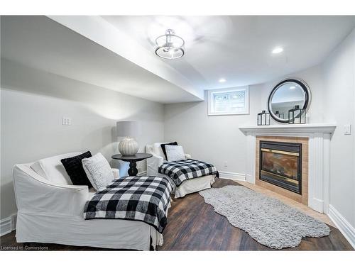 3 Oldenburg Road, Carlisle, ON - Indoor Photo Showing Bedroom With Fireplace