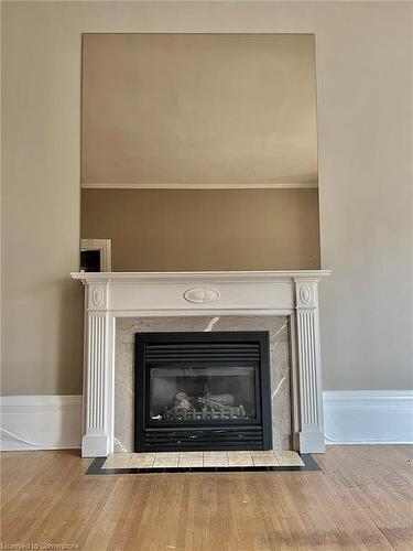 2-272 Park Street S, Hamilton, ON - Indoor Photo Showing Living Room With Fireplace