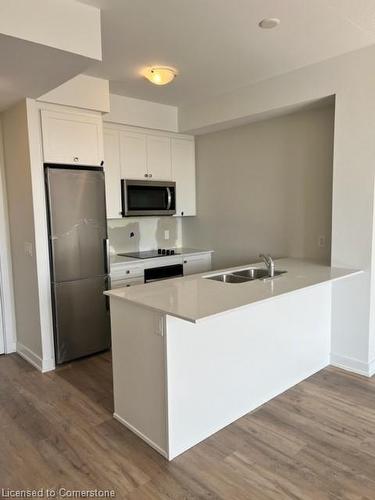 519-600 North Service Road, Stoney Creek, ON - Indoor Photo Showing Kitchen With Double Sink