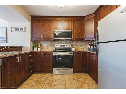 39 Thames Way, Mount Hope, ON - Indoor Photo Showing Kitchen With Double Sink