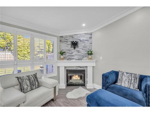 27 Emperor Avenue, Hamilton, ON - Indoor Photo Showing Living Room With Fireplace