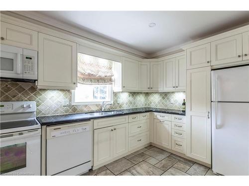 23-3125 Pinemeadow Drive, Burlington, ON - Indoor Photo Showing Kitchen With Double Sink