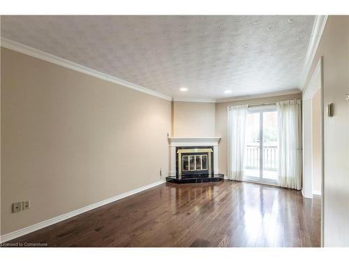 23-3125 Pinemeadow Drive, Burlington, ON - Indoor Photo Showing Living Room With Fireplace