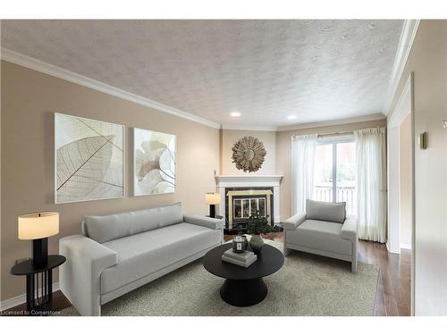 23-3125 Pinemeadow Drive, Burlington, ON - Indoor Photo Showing Living Room With Fireplace