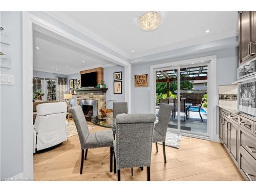 101 Boulding Avenue, Waterdown, ON - Indoor Photo Showing Dining Room With Fireplace