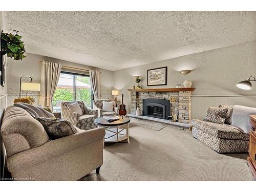 4489 Concord Place, Burlington, ON - Indoor Photo Showing Living Room With Fireplace