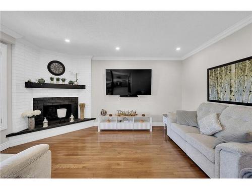 10 Vega Crescent, Stoney Creek, ON - Indoor Photo Showing Living Room With Fireplace