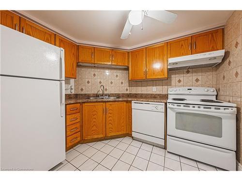 504-175 Hunter Street E, Hamilton, ON - Indoor Photo Showing Kitchen With Double Sink