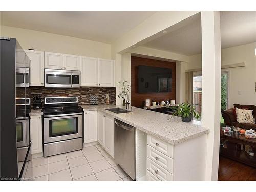 670 Lott Crescent, Milton, ON - Indoor Photo Showing Kitchen With Double Sink