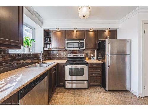 302-1212 Fennell Avenue E, Hamilton, ON - Indoor Photo Showing Kitchen With Stainless Steel Kitchen With Double Sink