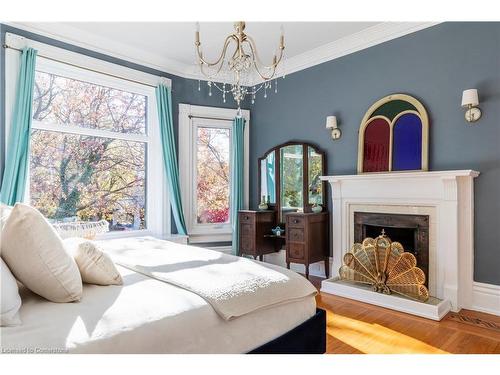 114 Aberdeen Avenue, Hamilton, ON - Indoor Photo Showing Bedroom With Fireplace