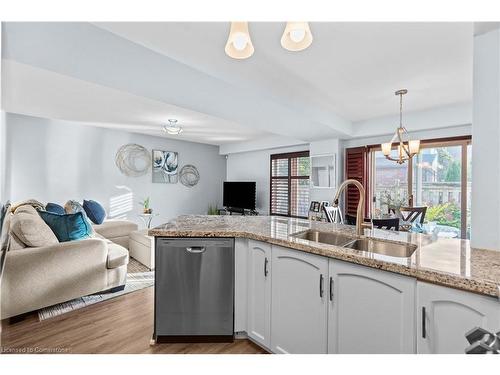 9-18 Cedar Street, Grimsby, ON - Indoor Photo Showing Kitchen With Double Sink