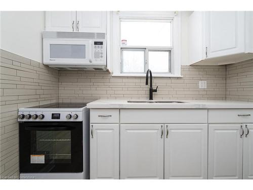 1-228 Crockett Street, Hamilton, ON - Indoor Photo Showing Kitchen With Double Sink