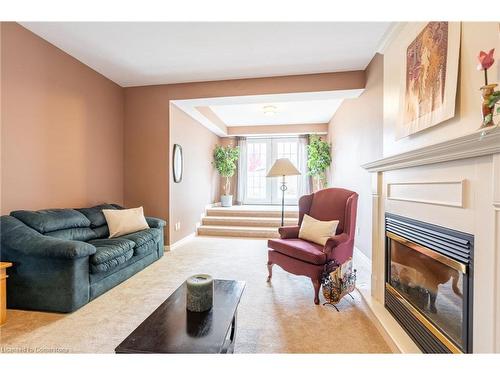 8503 Greenfield Crescent, Niagara Falls, ON - Indoor Photo Showing Living Room With Fireplace