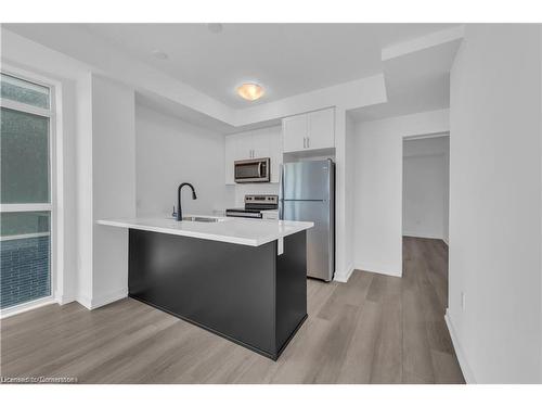 406-460 Dundas Street E, Waterdown, ON - Indoor Photo Showing Kitchen With Stainless Steel Kitchen