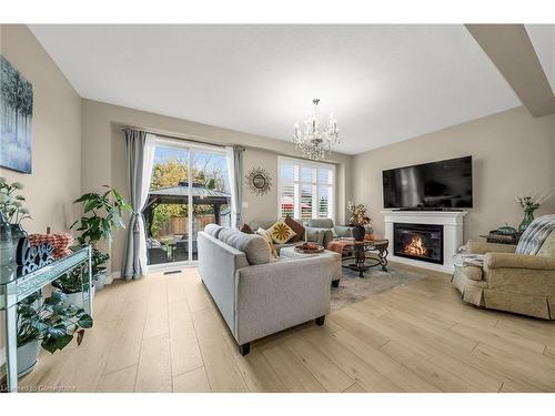 21-1890 Rymal Road East, Hamilton, ON - Indoor Photo Showing Living Room With Fireplace