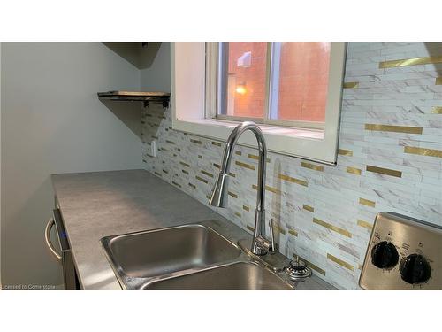 1-55 West Avenue S, Hamilton, ON - Indoor Photo Showing Kitchen With Double Sink