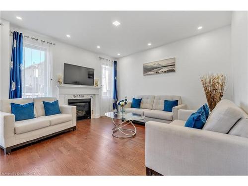 1519 Farmstead Drive, Milton, ON - Indoor Photo Showing Living Room With Fireplace