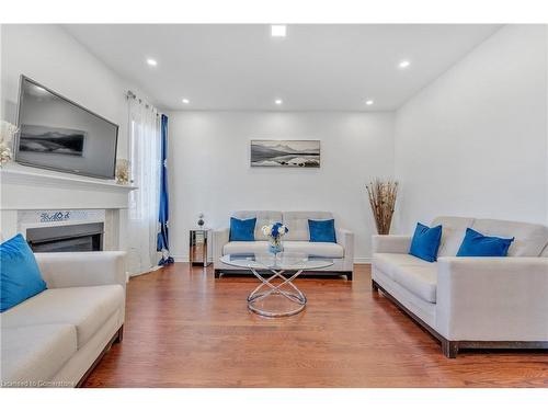 1519 Farmstead Drive, Milton, ON - Indoor Photo Showing Living Room With Fireplace