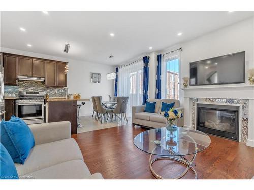 1519 Farmstead Drive, Milton, ON - Indoor Photo Showing Living Room With Fireplace