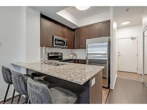 216-1940 Ironstone Drive, Burlington, ON - Indoor Photo Showing Kitchen With Double Sink With Upgraded Kitchen