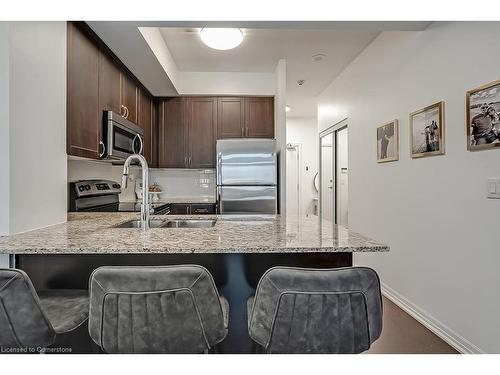 216-1940 Ironstone Drive, Burlington, ON - Indoor Photo Showing Kitchen With Double Sink