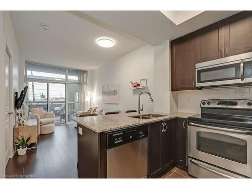 216-1940 Ironstone Drive, Burlington, ON - Indoor Photo Showing Kitchen With Double Sink