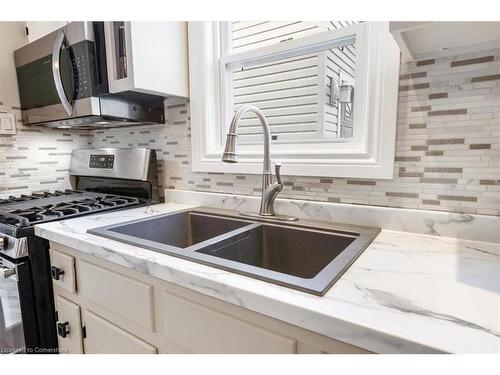 888 Green Mountain Road E, Stoney Creek, ON - Indoor Photo Showing Kitchen With Double Sink