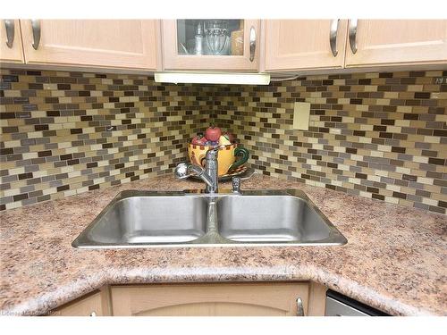 408-851 Queenston Road, Stoney Creek, ON - Indoor Photo Showing Kitchen With Double Sink