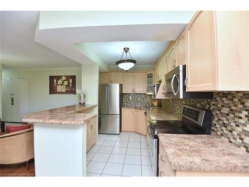 408-851 Queenston Road, Stoney Creek, ON - Indoor Photo Showing Kitchen