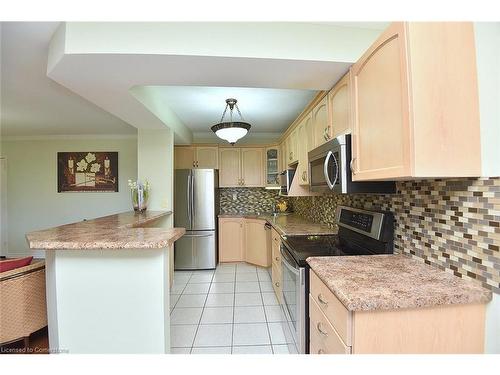 408-851 Queenston Road, Stoney Creek, ON - Indoor Photo Showing Kitchen