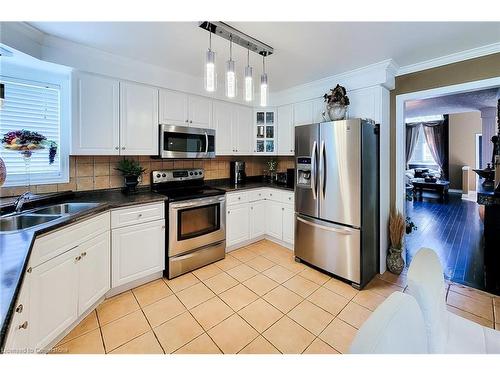 26 Grassyplain Drive, Mount Hope, ON - Indoor Photo Showing Kitchen With Double Sink