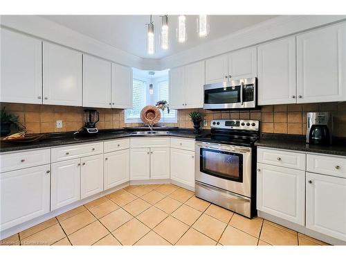 26 Grassyplain Drive, Mount Hope, ON - Indoor Photo Showing Kitchen With Double Sink