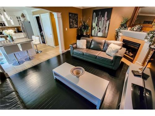 26 Grassyplain Drive, Mount Hope, ON - Indoor Photo Showing Living Room With Fireplace